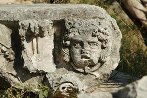 Steingesicht in der antiken Stadt Myra in Demre, Antalya, Türkei foto