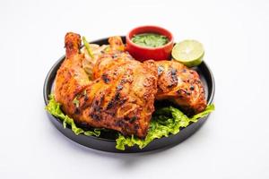 Tandoori-Huhn ist ein indisches, nicht vegetarisches, scharfes Essen foto