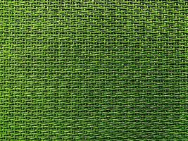 nahaufnahme grün das ist zu einem netz verwoben. Natura-Seilstruktur als Hintergrund. voller Rahmen aus eng gewebtem Seilmuster. mit Platz für Text, für einen Hintergrund. foto