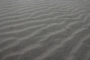 Textur Sand am Strand als Hintergrund und Textur foto