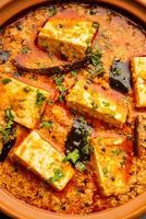 Paneer Khus Khus Curry oder Hüttenkäse Posto Masala aus Mohn, indisches Rezept foto