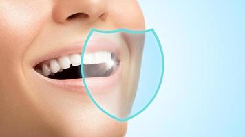 Zähne geschützt durch gute Hygiene, Produkte und Zahnpflege foto