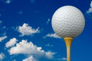 Golfball und Tee foto