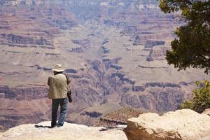 Fotograf, der am Grand Canyon schießt foto