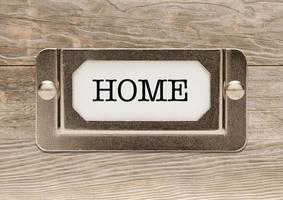 Home-Metall-Aktenschrank-Etikettenrahmen auf Holz foto