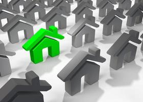 3D-Darstellung eines hellgrünen Haussymbols, das sich von vielen anderen grauen Häusern abhebt foto