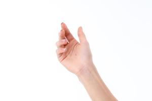 weibliche Hand streckte sich isoliert auf weißem Hintergrund foto