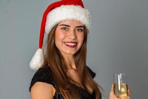 Nahaufnahme von Beauty Girl in Santa Hut foto