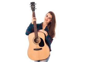 junge Brünette Mädchen mit Gitarre foto