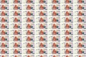 1000 kambodschanische Riels-Scheine, die im Geldproduktionsförderer gedruckt wurden. Collage aus vielen Rechnungen. Konzept der Währungsabwertung foto