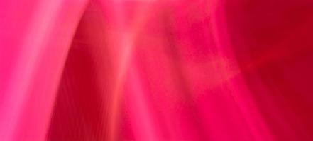 roter rosa abstrakter hintergrund mit gewellten linien foto