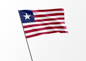 Liberia-Flagge, die hoch im isolierten Hintergrund fliegt Liberia-Unabhängigkeitstag foto