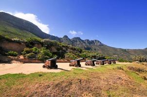 Kanonen entlang Chapmans Peak, Kapstadt, Südafrika foto