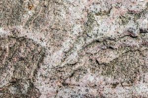 Nahaufnahme einer Granit- und Steinwandstruktur in hoher Auflösung. foto