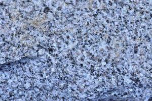 Nahaufnahme einer Granit- und Steinwandstruktur in hoher Auflösung. foto