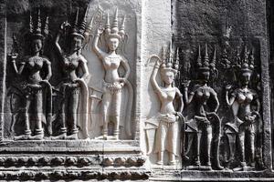 Detail der Steinmetzarbeiten von Apsara ist ein schönes und verführerisches Mädchen der hinduistischen Mythologie in Angkor Wat, Kambodscha foto