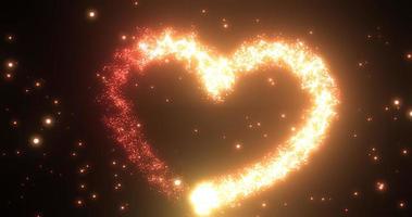 orange goldene herzliebe, die für valentinstagfeiertage von magischen energielinien und partikeln auf schwarzem hintergrund glänzend leuchtet. abstrakter Hintergrund foto
