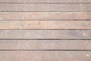 rissige alte graue Holzstruktur mit horizontalen Streifen für den Hintergrund foto
