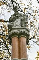 Ether Monument, auch bekannt als der barmherzige Samariter, ist eine Statue und ein Springbrunnen in der Nähe der nordwestlichen Ecke von Bostons Public Garden. foto