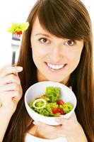 Frau mit gesundem Essen foto