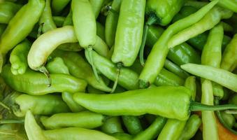 süße grüne Chili Hintergrund Banane Paprika Capsicum Annuum foto