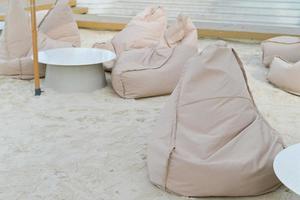 Sessel Tasche auf Sand selektiven Fokus foto