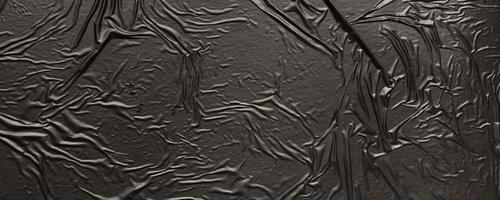 schwarzer zerknitterter und zerknitterter plastiktütentexturhintergrund foto