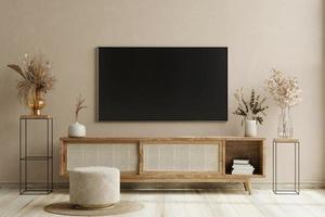 smart tv an der cremefarbenen wand im wohnzimmer, minimalistisches design. foto