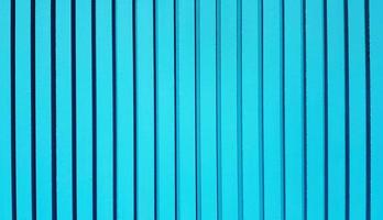 Grünes pastellfarbenes Linienmuster der Betonwand für den Hintergrund. bemalte Zementsäule aus Tapeten und Außendesign oder Baustruktur. foto