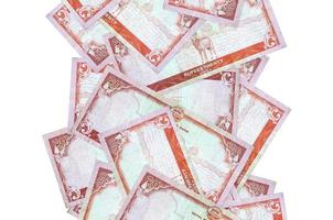 20 nepalesische Rupien-Scheine, die einzeln auf Weiß herunterfliegen. viele banknoten fallen mit weißem copyspace auf der linken und rechten seite foto