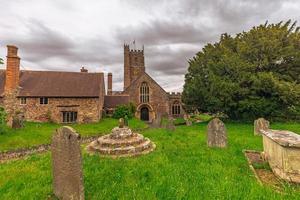 die alte ländliche Stadt Dunster, England. foto