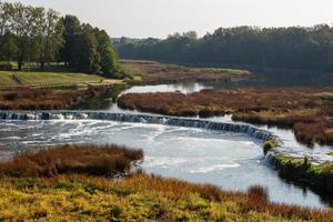 stadt kuldiga und ventas-wasserfall foto