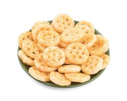 salzige Rad Snacks auf einem grünen Teller foto