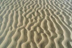 Wüstensanddünen Kunstwerk Textur Hintergrund foto
