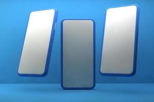 Smartphones mit leeren Bildschirmen auf blauem Hintergrund. 3D-Rendering. foto