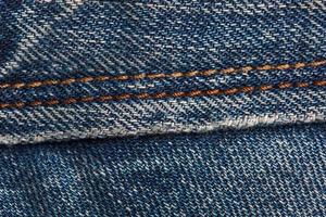 Closeup Textur Thread und Jeanshose nähen foto