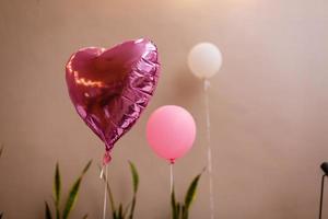 rosa Ballon in Form eines Herzens foto