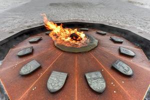 Die hundertjährige Flamme auf dem Parliament Hill in Ottawa, Ontario, Kanada erinnert an das 100-jährige Jubiläum Kanadas als Konföderation foto