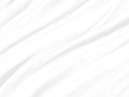 weiße mode textil glatte abstrakte schönheit sauberer und weicher stoff texturiert. freie Artform verzieren Hintergrund foto