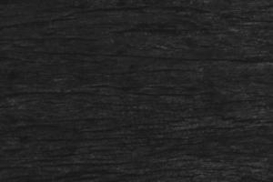 Holz schwarzer Tischhintergrund, Draufsicht der dunklen Textur, raumgrauer Luxusrohling für Design foto