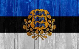 Flagge von Estland auf einem strukturierten Hintergrund. Konzept-Collage. foto