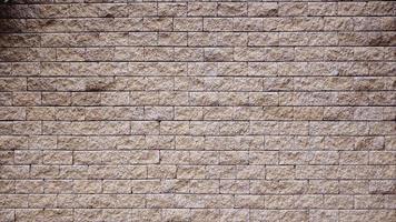 nahtlose Textur des braunen Steinsteins, Hintergrund, mit Stein ausgekleidete Wände. Sandstein. Steinhintergrundwand. Verblendstein .Architektur Design. für Photoshop .3d Mapping Hintergrund