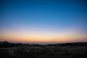 Landschaft bei Sonnenaufgang foto