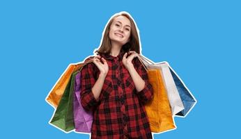 junge Frau mit Einkaufstüten foto