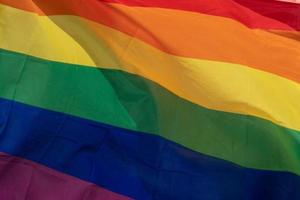 Regenbogen-Friedensflagge des homosexuellen Stolzes foto
