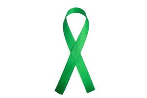 grünes Band des Krebssymbols für Kopienraum foto