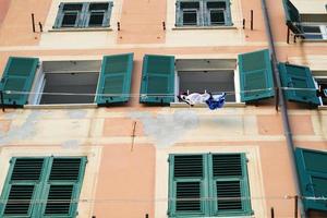 camogli, ligurien, italien malerisches fischerdorf bemalte häuser foto