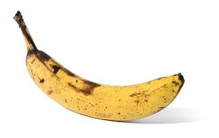 reife Banane auf weißem, isoliertem Hintergrund foto