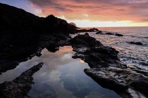 Sonnenuntergang über dem Meer foto