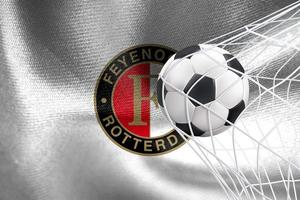 UEFA Champions League 2023, Feyenoord-Flagge mit einem Fußball im Netz, UEFA-Hintergrundbild, 3D-Arbeit und 3D-Bild. Eriwan, Armenien - 27. Januar 2023 foto